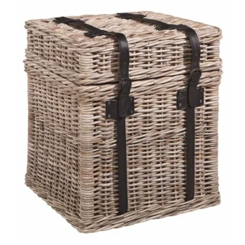 A lovely rattan trunk with dark brown leather strap and buckle detail.