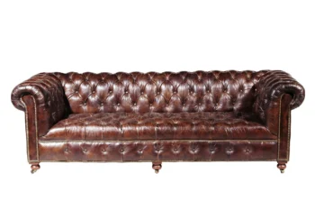 Halo leather sofa with a hand tufted back and seat in a vintage cigar finish.