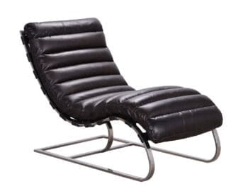A 1940s-inspired industrial chaise lounger with a sculpted chrome frame and deep channel tufting black leather.