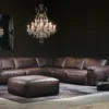 A stylish room scene showing the Halo Truffle Modular Sofa Collection in Antique Black leather.